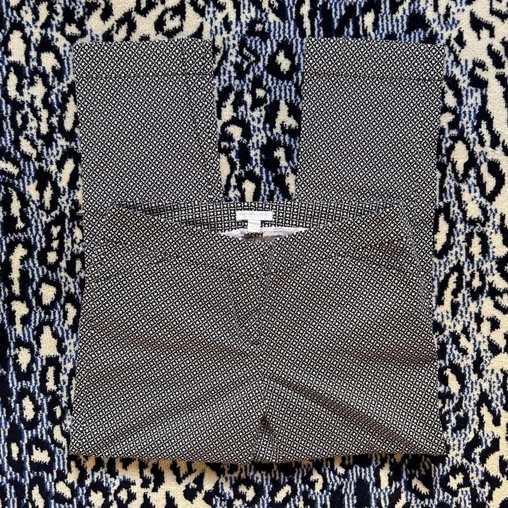 New York & Company black & white starburst geometric stretch pants • size 6